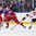 BUFFALO, NEW YORK - DECEMBER 28: Russia's Klim Kostin #24 skates with the puck as Switzerland's Dominik Egli #27 attempts to slow him down during the preliminary round of the 2018 IIHF World Junior Championship. (Photo by Andrea Cardin/HHOF-IIHF Images)

